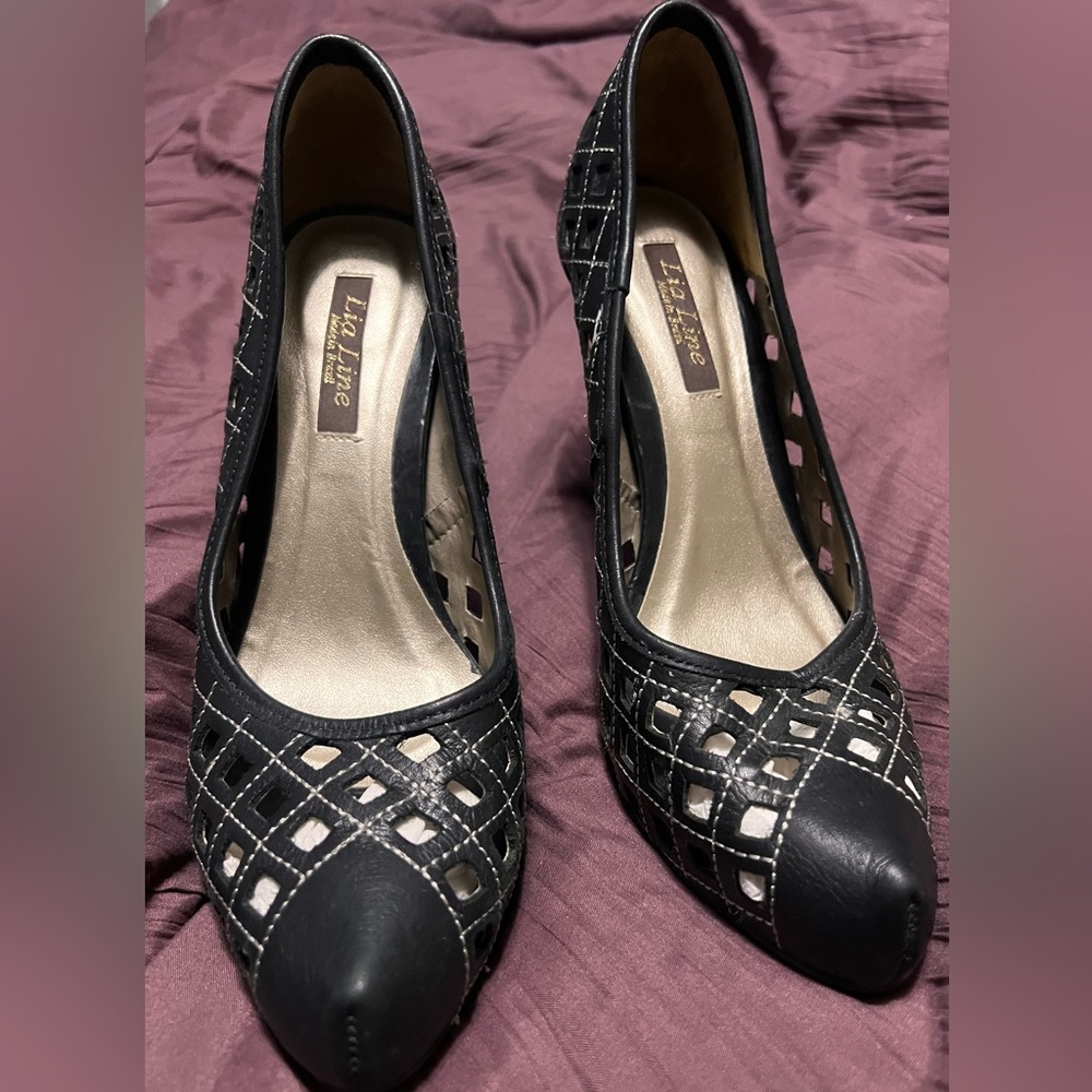Lia Line leather pumps with cut out design and sleek heel Size 8